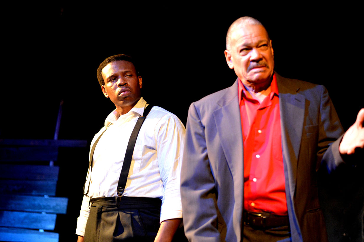 Damien A. Moses as Mister and Reynauld Harris as Paw in The Color Purple