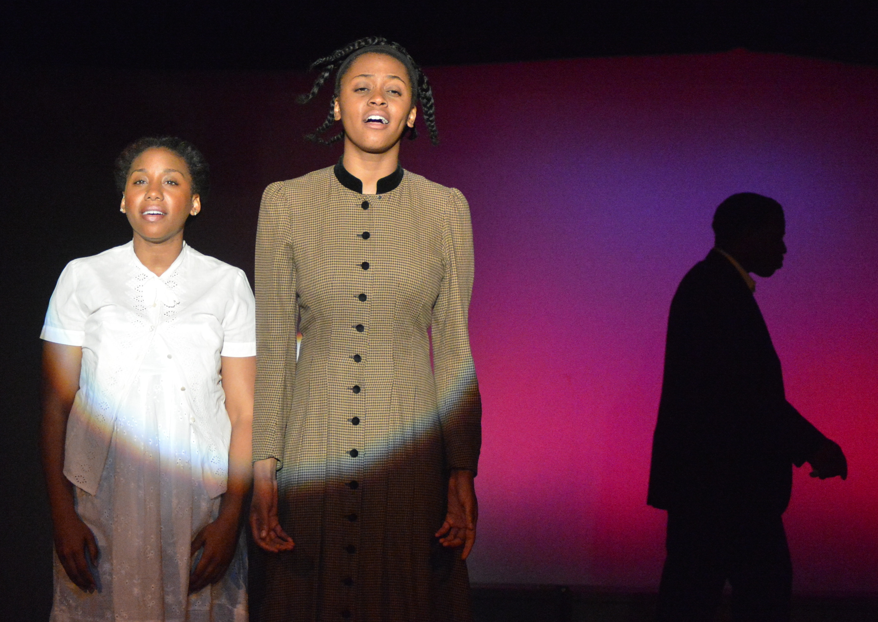 Giselle Nakhid as Netti and Asia Nelson as Celie in The Color Purple